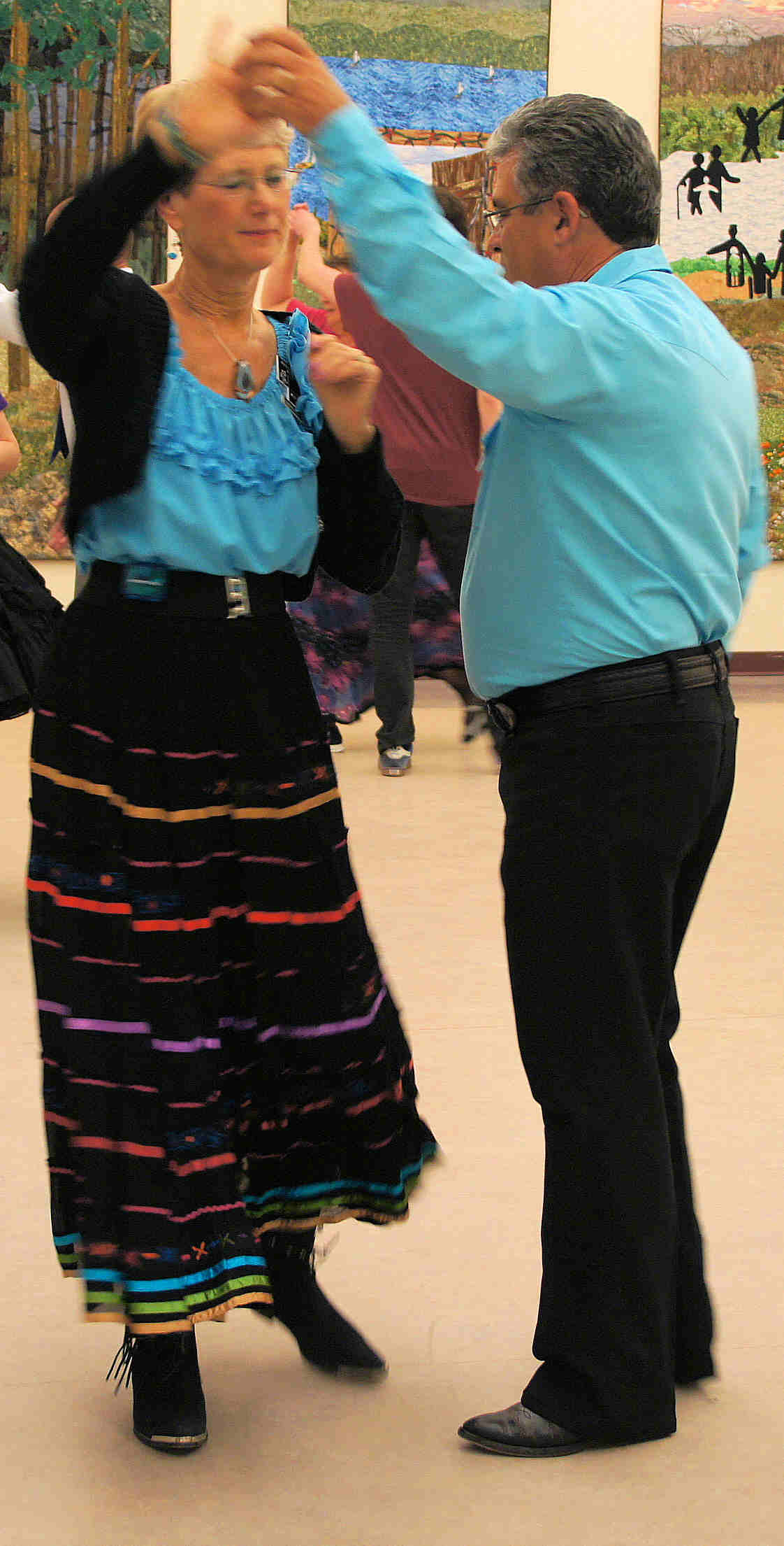 Dancing couple in casual attire